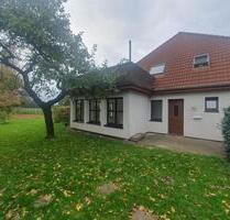 ruhige und helle 4 Zimmer EG-Wohnung mit viel Garten - Bruchhausen-Vilsen