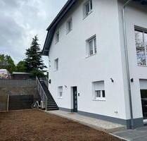 Moderne 2 Zimmer Wohnung mit große Terrasse und eigene Garten - Langenlonsheim