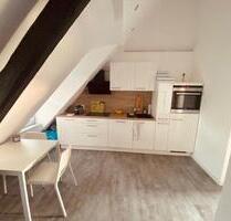 Traumhafte Dachgeschosswohnung mit Küche und E-Ladestation - Würselen