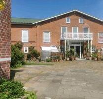 1,5 Zimmer Wohnung in Padenstedt Zentrum, historischem Resthof
