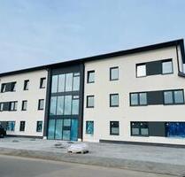 Stillvolle 4-Zimmer EG Neubauwohnung KFW 40 (Wärmep.+PV) mit Terrasse und Garten. - Bissendorf