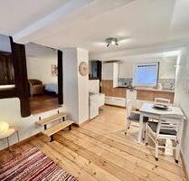 Charmante 1-Zimmer-Wohnung mit Wohnküche, Tageslichtbad und Gartenmitbenutzung - Vellmar