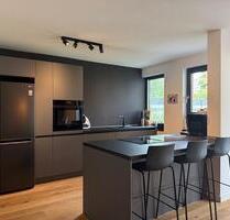 Schöne 3 Zimmer Gartenwohnung im Neubau in Hilden mit TG-Platz