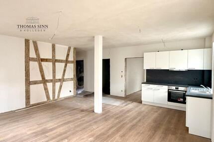 Charmante 3,5-Zimmer Hochparterre-Wohnung mit Terrasse & Fachwerkflair im kernsanierten Denkmal - Forchtenberg
