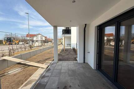 Traumhaft Wohnen! 3-Zimmer EG-Wohnung mit Garten und Einbauküche - Tüßling