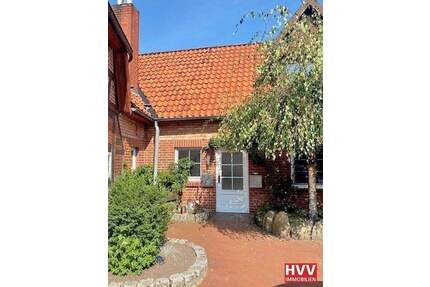 HVV Immobilien: Gemütliche 2,5 Zimmer Erdgeschoss-Wohnung über 2 Ebenen mit Dachterrasse! - Kirchlinteln Luttum