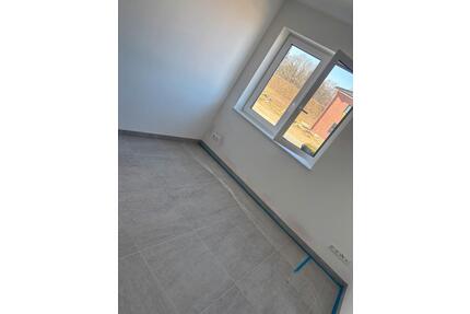 Moderne 2-Zimmer Neubauwohnung mit Terrasse und Gartenanteil - Soltau