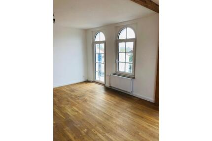 sanierte DG-Altbauwohnung 3-Zimmer mit Balkon und Garten - Bückeburg