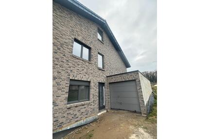 Neubau 4 Zimmer Wohnung - 1.615,00&nbsp;EUR Kaltmiete, ca.&nbsp; 105,00&nbsp;m&sup2; in Übach-Palenberg (PLZ: 52531)