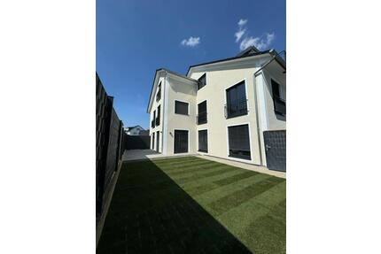 Lichtdurchflutete und geräumige 4‑Zimmer Wohnung mit Garten - Usingen