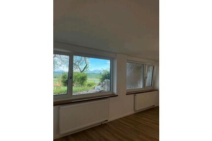 1 Zimmer Souterrainwohnung mit überdachter Terrasse und Bergblick - Söchtenau