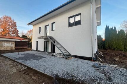 Moderne Erdgeschosswohnung mit Terrasse in Rödinghausen – Neubau, Erstbezug - Herford
