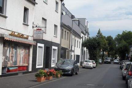 Köln-Sürth (Rheinnähe); helle, renovierte Dreizimmerwohnung mit großer Terrasse; WG geeignet
