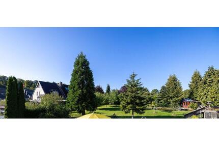 Ca. 160 QM große 3 Zimmer -Wohnung mit traumhaften Garten, Doppelgarage, neues Bad u. Küche, Kamin - Scharbeutz